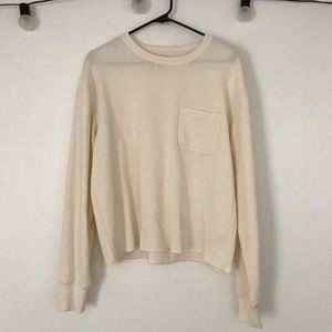 cream colored sweatshirt